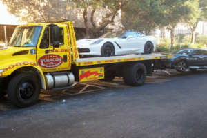 Chacon Towing Flatbed Towing Corvette and one on the hook
